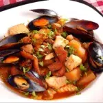 image of a plate with Sopa de Mariscos served in it