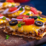 Homemade Mexican Pizza with toppings and melted cheese