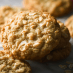 Freshly baked oatmeal cookies on a rustic table