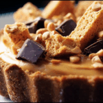 Peanut Butter Honeycomb Pie with honeycomb topping and chocolate drizzle